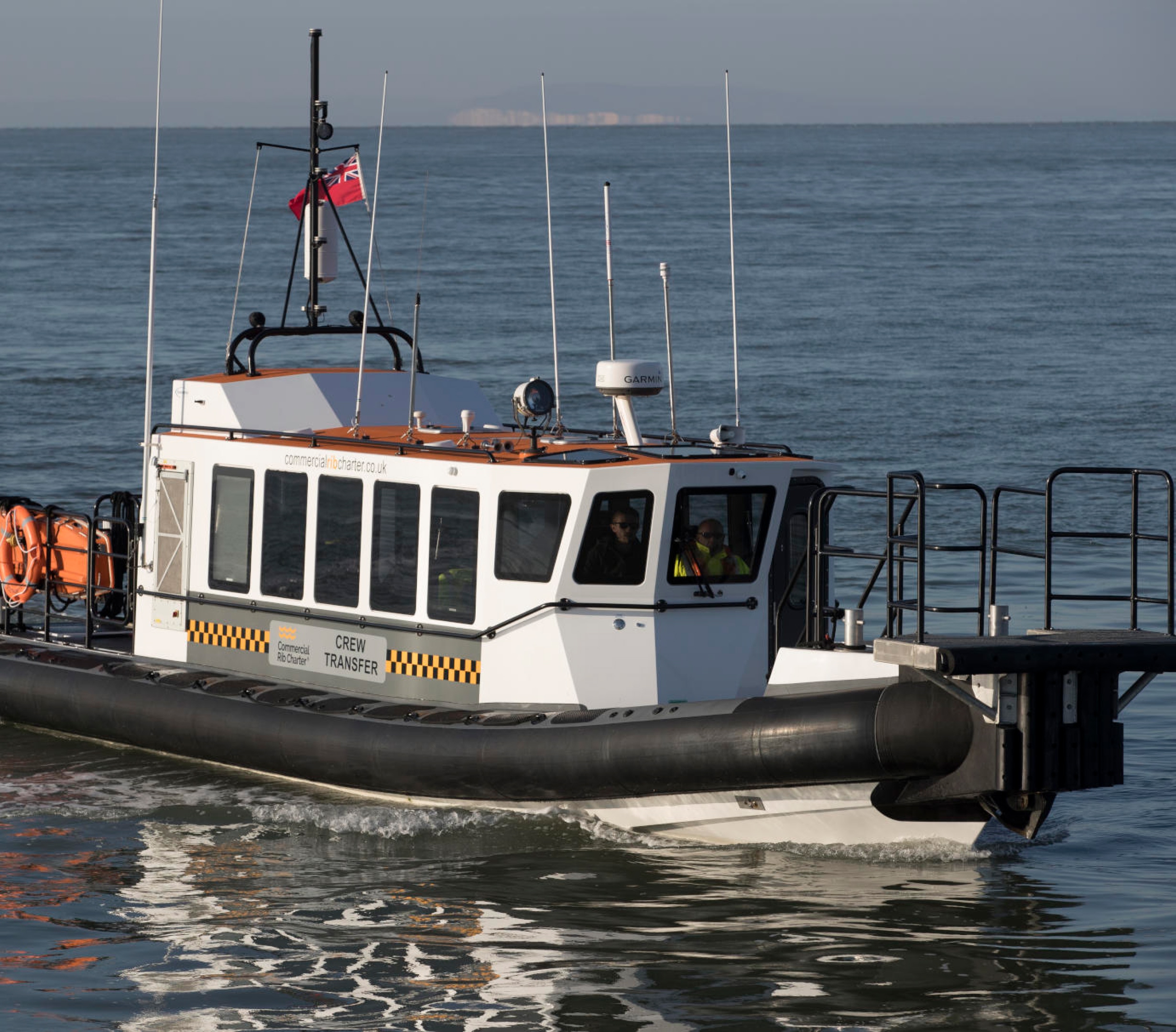 Solent Rib Charter crew transfer vessel underway on calm waters, providing safe and efficient marine transport for commercial offshore projects.