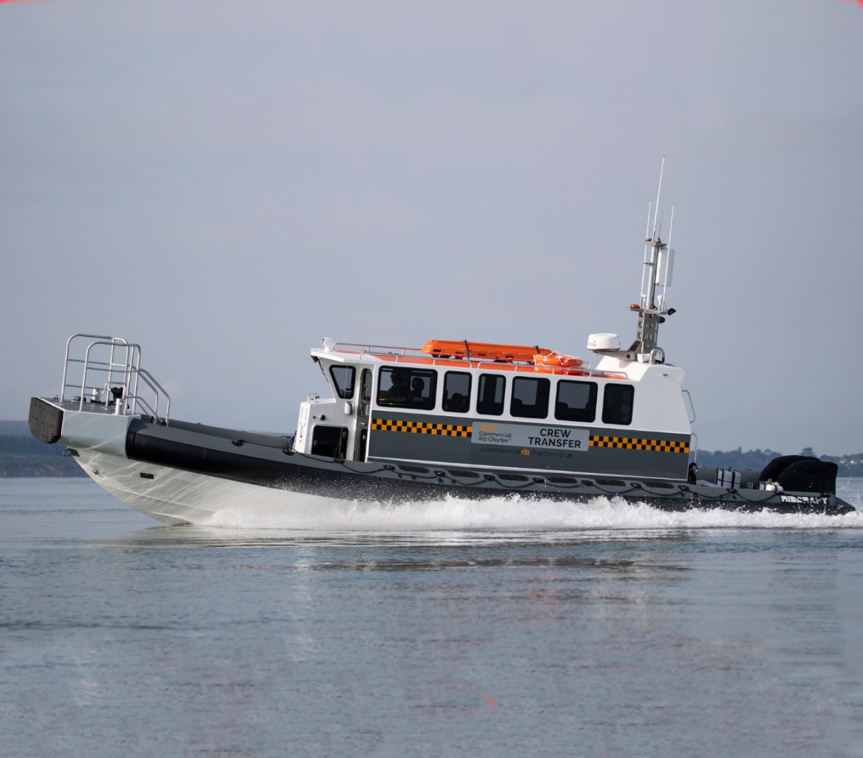 Solent Rib Charter crew transfer vessel cruising at speed on calm waters, delivering reliable marine transport for offshore and coastal projects.