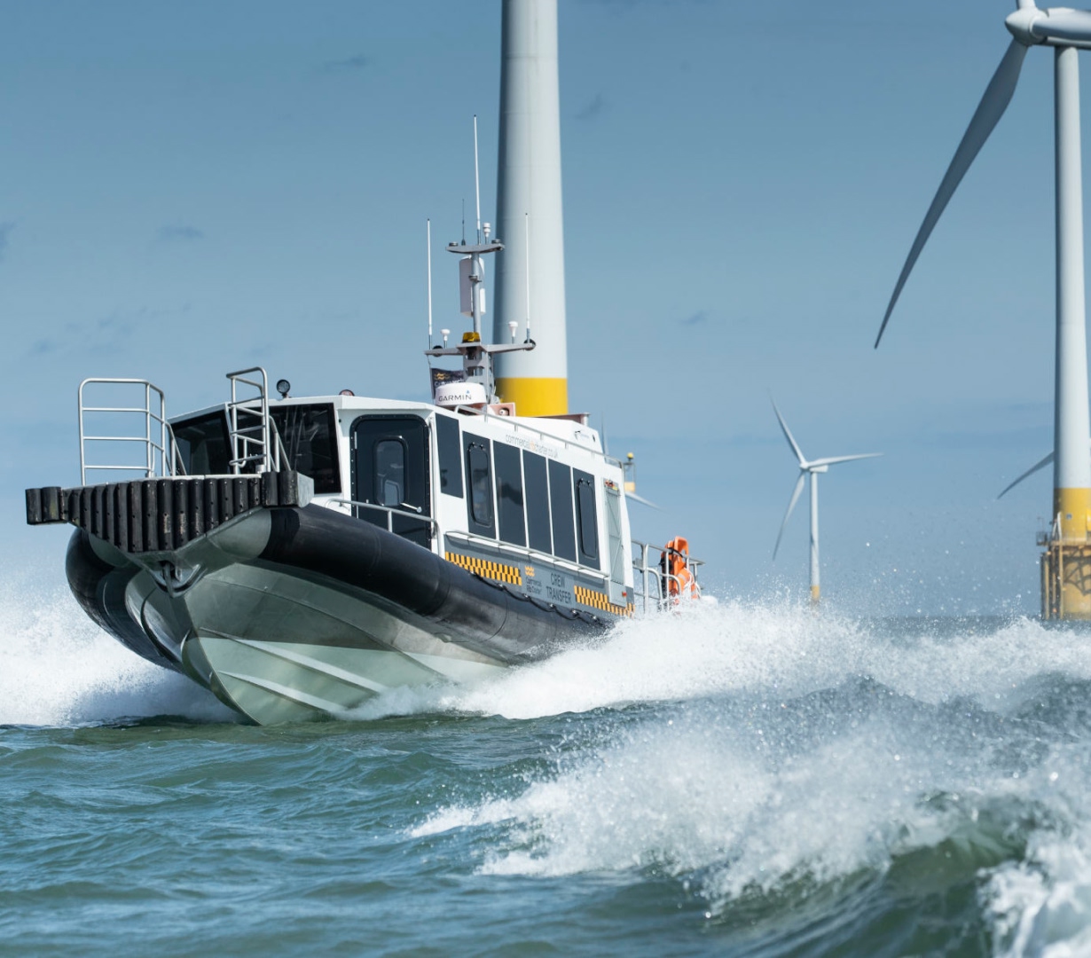 Solent Rib Charter crew transfer vessel operating at an offshore wind farm, providing fast and reliable marine support services.
