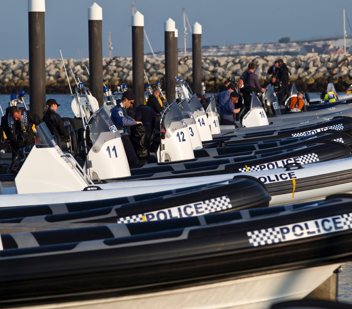Solent Rib Charter providing a fleet of police RIBs at the dockside, supporting maritime security training and marine operations.