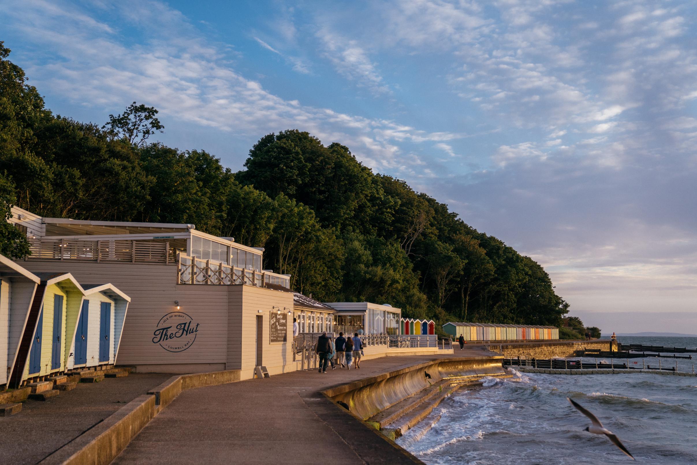 The Hut restaurant on the Isle of Wight at sunset visited during a Solent Rib Charter coastal boat experience